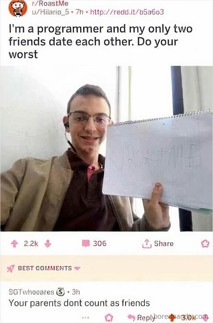A programmer holding a sign on Reddit with a funny comment about friends, featured in science memes for non-science people.