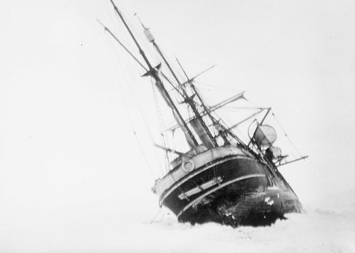 Old ship stranded in an icy sea, representing unbelievable historical events that people actually survived.