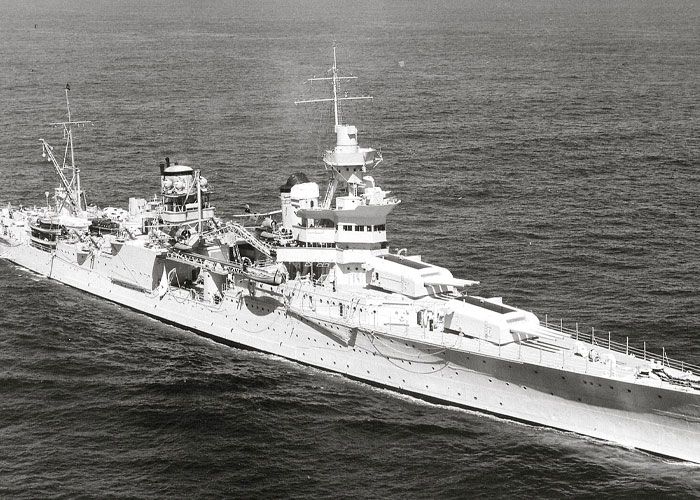 Black and white photo of a large battleship at sea representing unbelievable historical events that people survived.