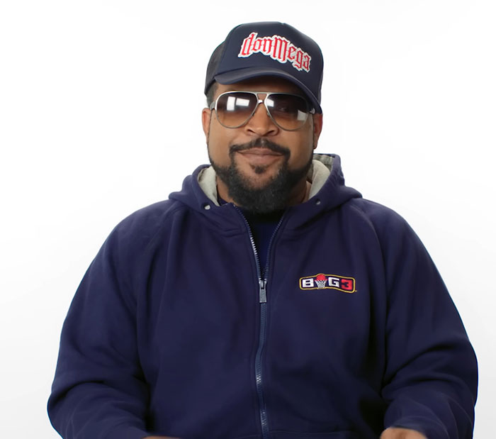 Ice Cube wearing sunglasses and cap, smiling while discussing War of the Worlds meme frenzy and 0% Rotten Tomatoes score. - 1