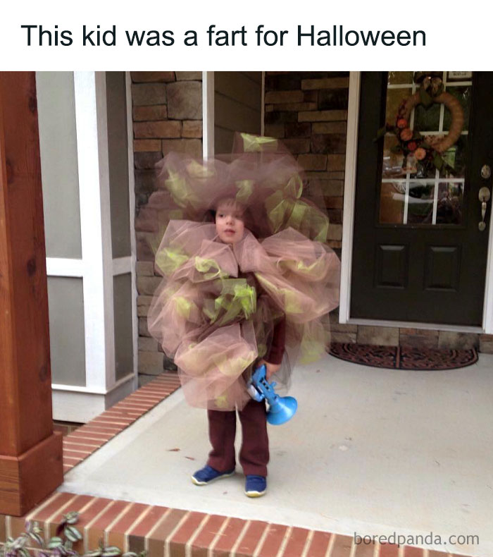 Child dressed in a creative and crafty Halloween costume holding a blue horn, showcasing ingenious crafty ideas.