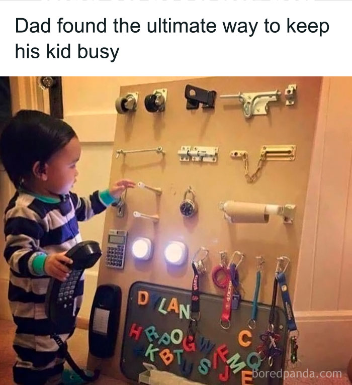 Child playing with a busy board featuring locks, lights, and gadgets, showcasing ingenious crafty ideas for keeping kids engaged.