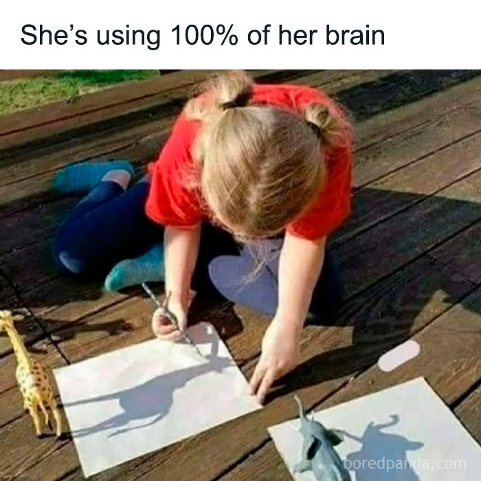 Child creating crafty shadow art using toy animals and paper, showcasing ingenious crafty ideas from a popular IG account.