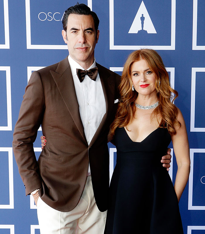 Isla Fisher and Sasha Baron Cohen posing on red carpet, highlighting Isla Fisher during tough couple of years amid split. - 1