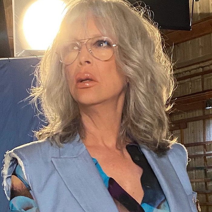 Jamie Lee Curtis, 66, with dramatically fuller lips, wearing glasses and a light blue blazer in a softly lit room. Jamie Lee Curtis, 66, with dramatically fuller lips, wearing glasses and a light blue blazer in a softly lit room.