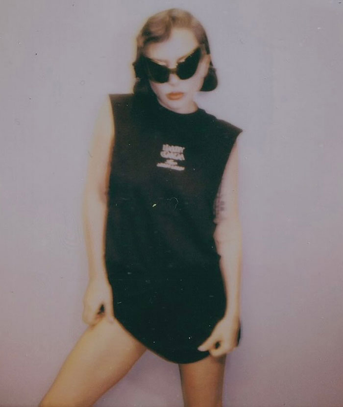 Lady Gaga posing in black outfit and sunglasses, linked to backlash over ageist and misogynistic comments at concert. - 13