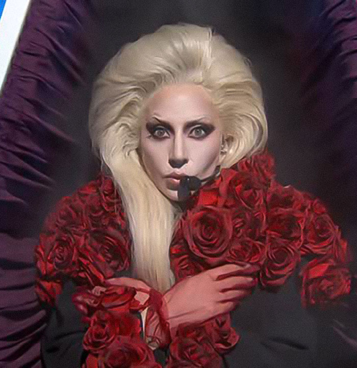 Lady Gaga performing at a concert wearing a red rose outfit, amid backlash over ageist and misogynistic comments. - 10