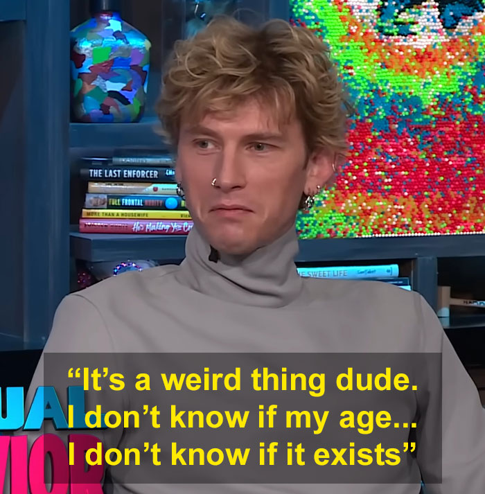 MGK in interview claiming he's half alien and unsure of his age while addressing personal questions on dating.