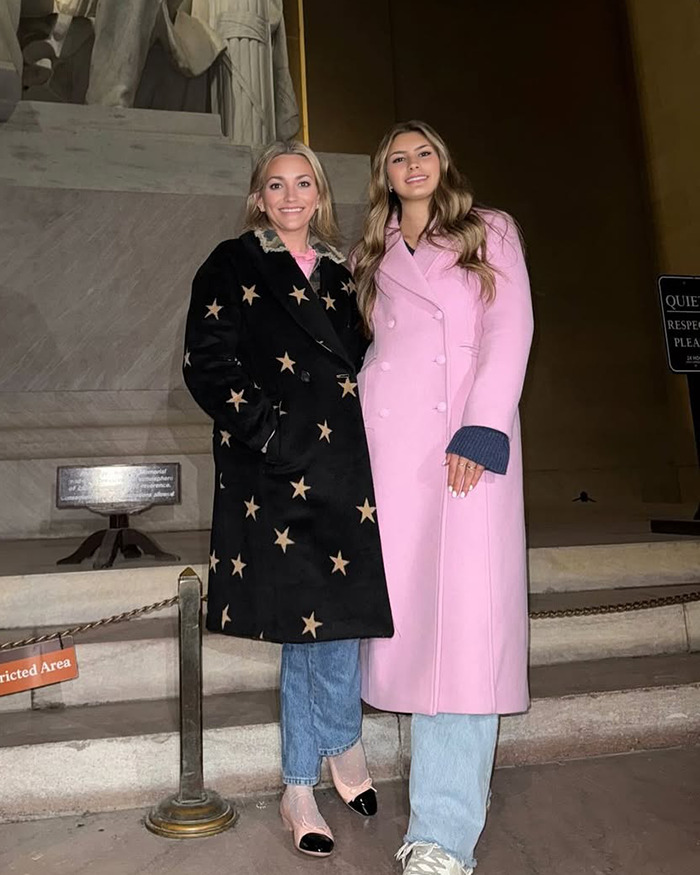 Two women standing together, one in a star-patterned coat and the other in a pink coat, related to Jamie Lynn Spears' daughter accident.