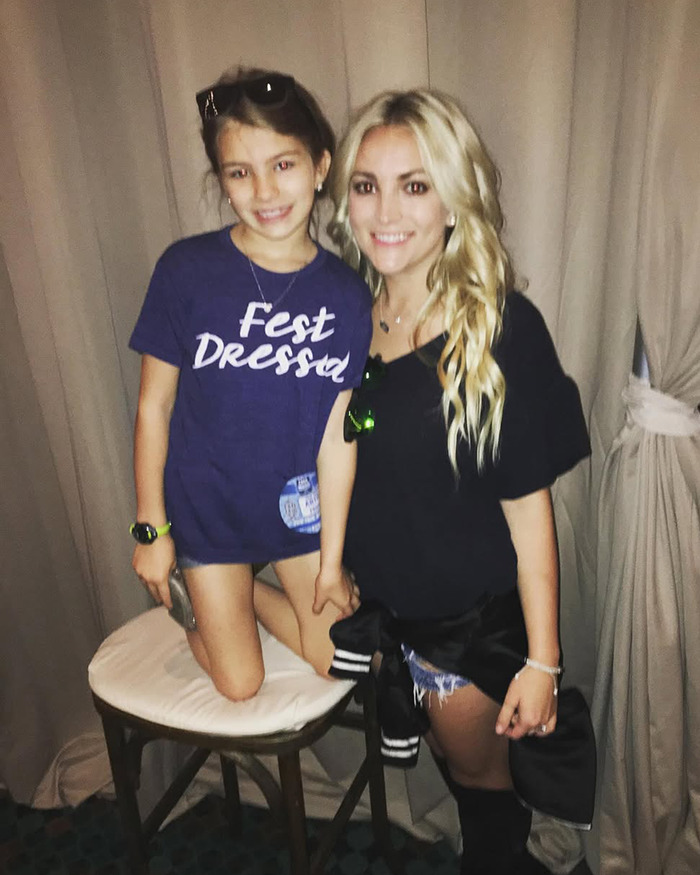 Jamie Lynn Spears with her daughter smiling indoors, highlighting Jamie Lynn Spears' daughter break silence accident coma.