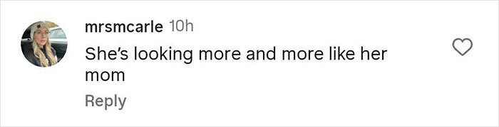 Comment stating she’s looking more and more like her mom, posted by user mrsmcarle in a social media thread. - 48