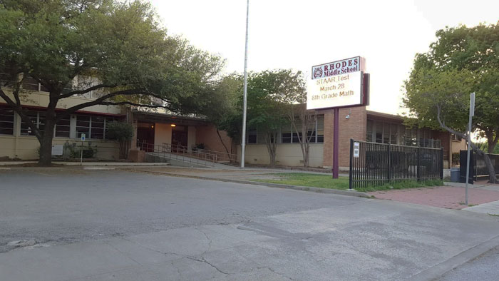 Rhodes Middle School exterior with signage, related to mom allegedly helping 13-year-old plan mass school shooting. - 5