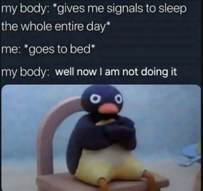 Penguin character sitting with arms crossed, illustrating a humorous take on body signals and neurodivergence struggles.