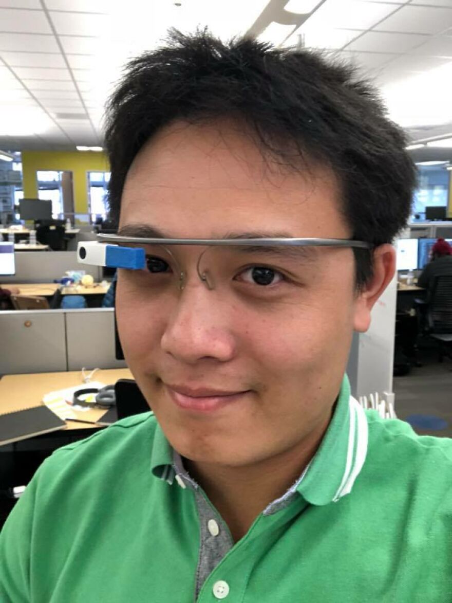 Man wearing smart glasses in office setting, symbolizing technology amid in-flight showdown and law-breaking incident context. Man wearing smart glasses in office setting, symbolizing technology amid in-flight showdown and law-breaking incident context.