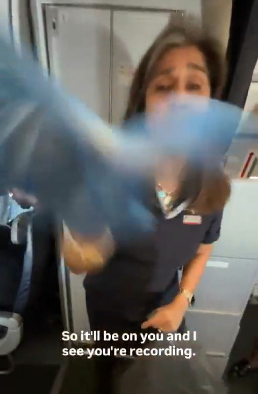 Flight attendant confronting man during in-flight showdown after breaking the law in airplane bathroom. Flight attendant confronting man during in-flight showdown after breaking the law in airplane bathroom.