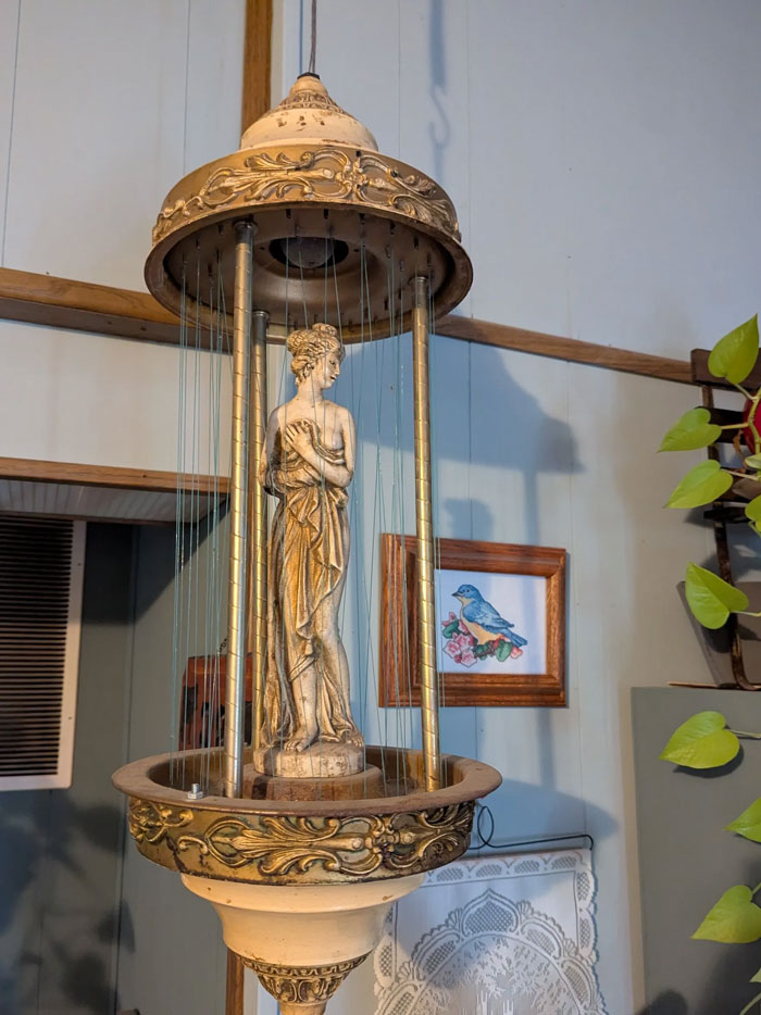 Vintage decorative statue lamp with intricate detailing, one of the magical decor pieces enhancing home ambiance.