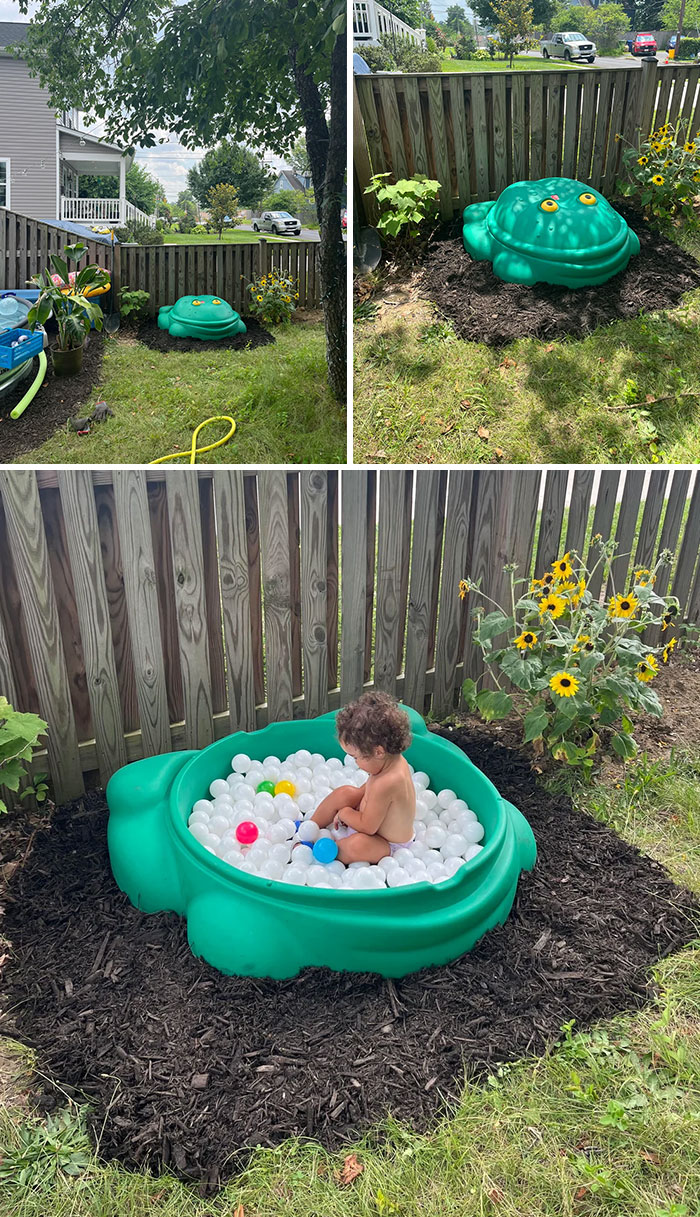 Green frog-shaped ball pit in a backyard garden, a creative thrift store find for outdoor play area.