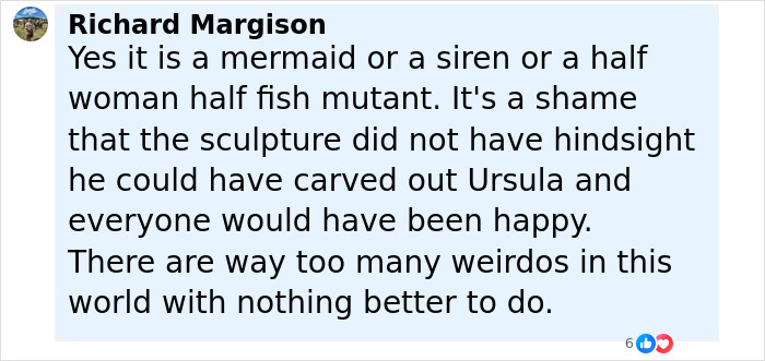 Comment discussing a mermaid statue described as a half woman half fish mutant and criticized by viewers online. - 26