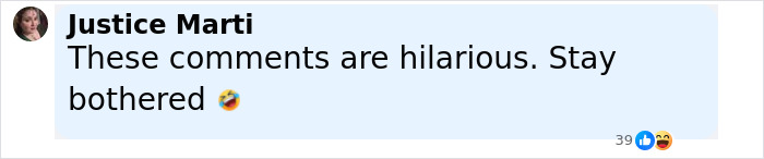 Commenter Justice Marti reacts to hilarious comments with a laughing emoji in a light blue social media post.