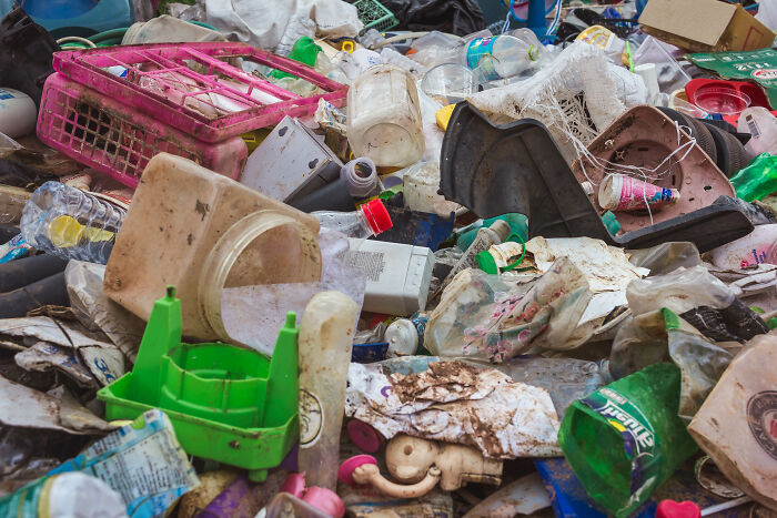 Pile of trash and plastic waste where injured doggo was rescued and nursed back to health by caring netizens. Pile of trash and plastic waste where injured doggo was rescued and nursed back to health by caring netizens.