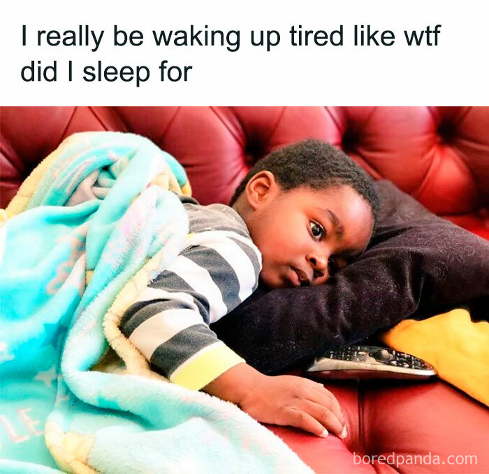 Child lying on a couch looking tired and wrapped in a blanket, illustrating funny memes that feel too real.