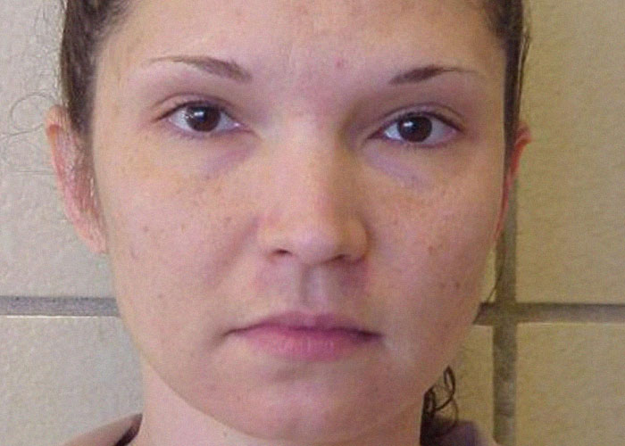 Close-up of a woman with a serious expression, illustrating moments when paranoia turned into real-life terror cases.