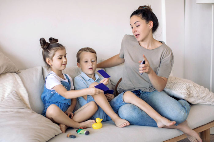 Teen twins babysitting younger kids, missing out on typical teenage experiences while caring for six siblings.