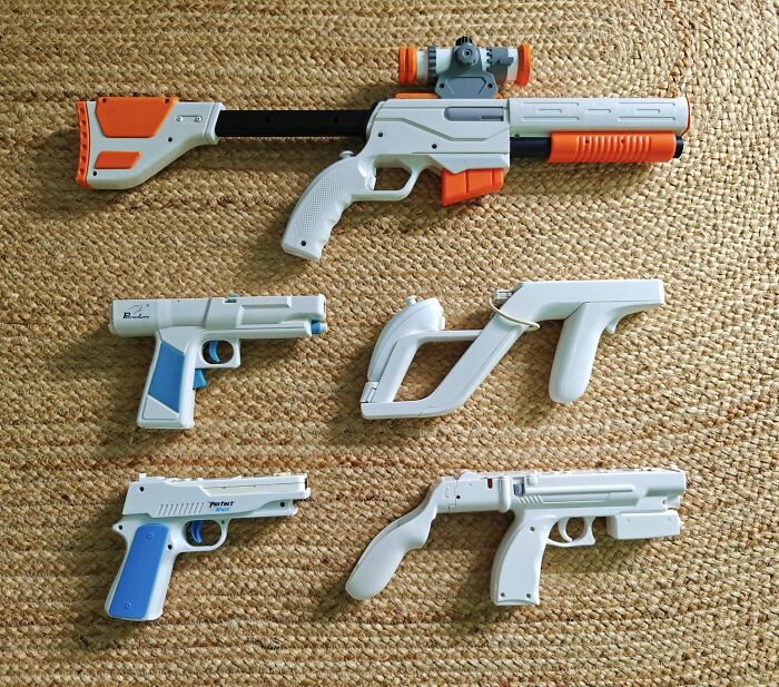 Retro gaming nostalgia with classic light gun accessories from popular video game consoles of the ’80s and ’90s.