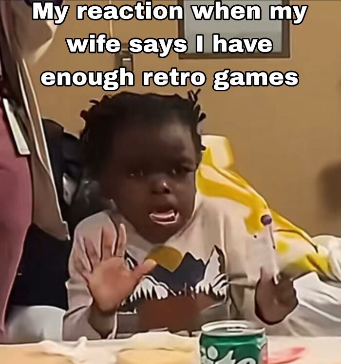 Child making a shocked and defensive face reacting to having enough retro games in a nostalgic gaming setting.