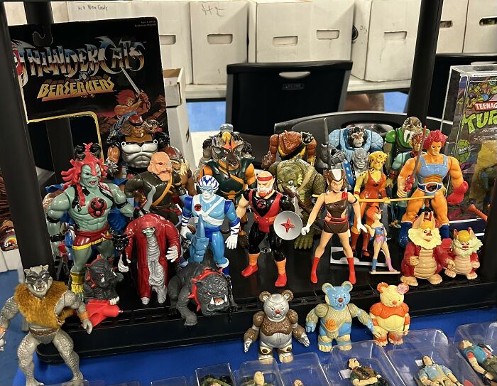 Collection of retro gaming and nostalgia action figures from popular 80s, 90s, and 00s animated series and games.