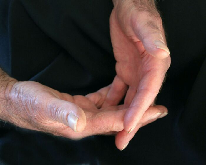 Close-up of hands making gentle gestures, illustrating totally safe things that people can’t stop freaking out about.