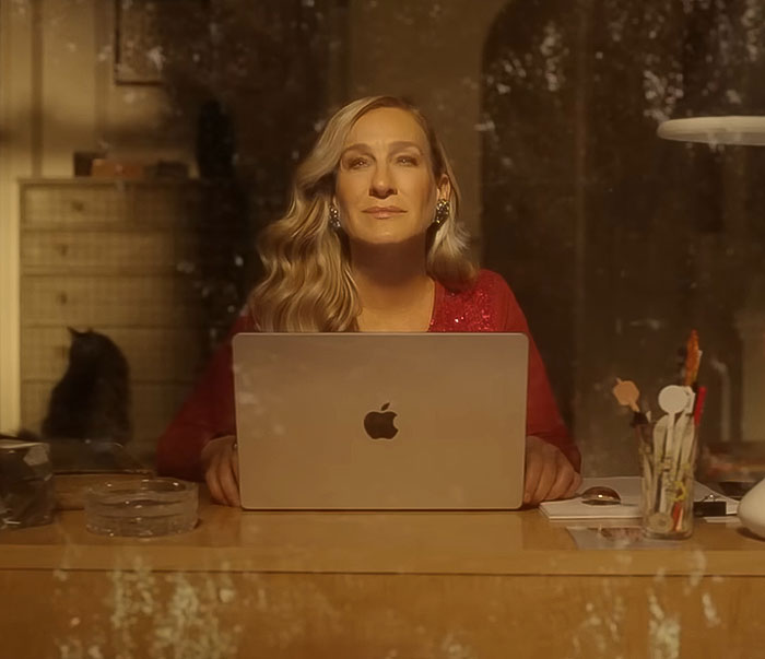 Sarah Jessica Parker sitting at a desk with a laptop, responding to critics of And Just Like That series finale. Sarah Jessica Parker sitting at a desk with a laptop, responding to critics of And Just Like That series finale.