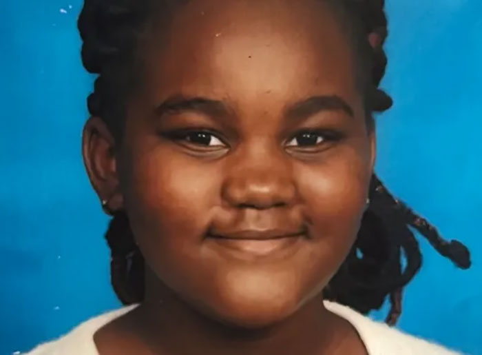 Portrait of a young girl with braided hair, related to hospital fires 15 nurses after 12-year-old patient news story.