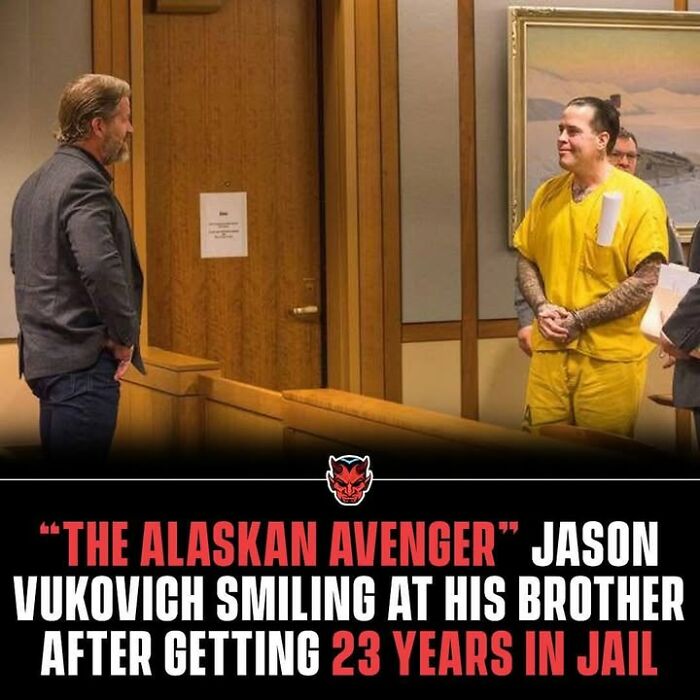 Man in yellow prison uniform smiling during courtroom interaction, illustrating creepy facts about long jail sentences.