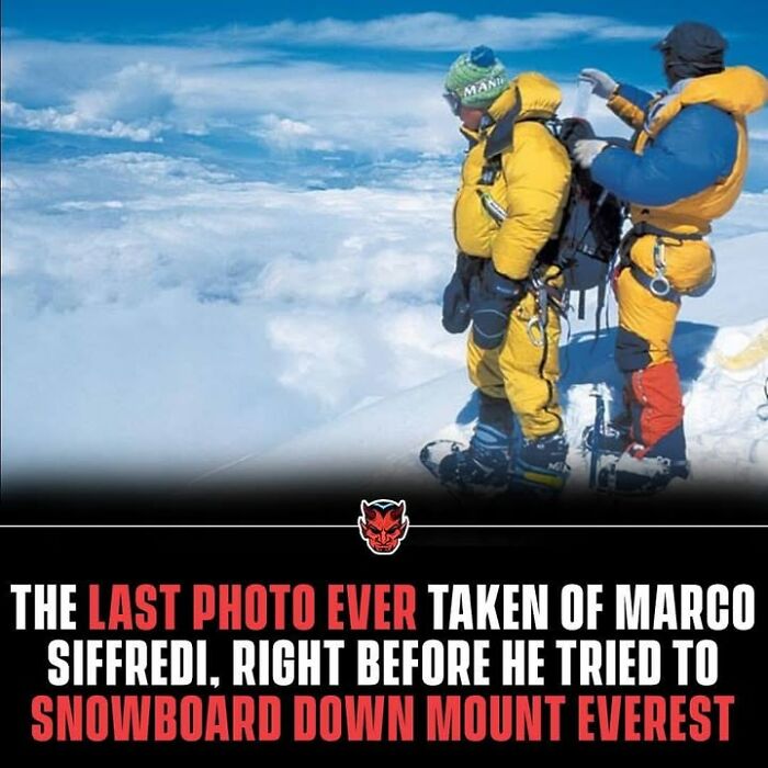 Two climbers in yellow expedition gear stand on a snowy peak above the clouds, illustrating creepy adventure facts.