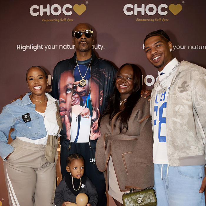 Snoop Dogg with family at event, highlighting parenting and sparking discussion on LGBTQ+ representation in kids films. Snoop Dogg with family at event, highlighting parenting and sparking discussion on LGBTQ+ representation in kids films.