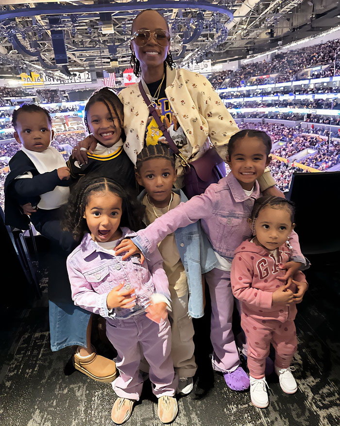 Snoop Dogg with children at a sports arena amid discussion of LGBTQ+ representation in kids’ films sparking controversy. Snoop Dogg with children at a sports arena amid discussion of LGBTQ+ representation in kids’ films sparking controversy.
