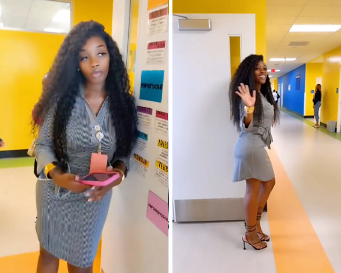 Teacher in a striped dress walking in school hallway, sparking viral debate for showing off curves back to school style.