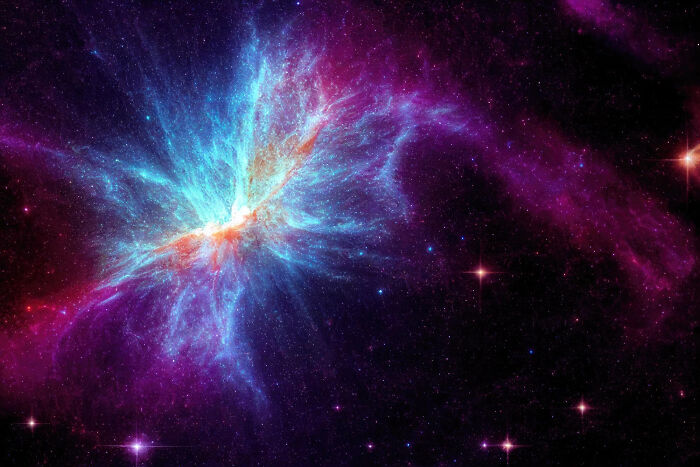 Colorful cosmic nebula with bright stars against dark space, illustrating a ticking big lifetime event in the universe.