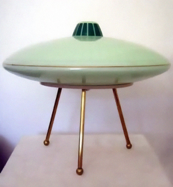 Vintage tripod lamp with a saucer-shaped shade, evoking June Cleavers vintage closet style and old-timey charm.