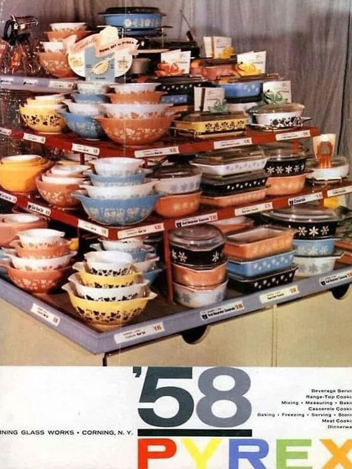 Vintage Pyrex kitchenware display from 1958, showcasing colorful old-timey dishes in June Cleavers vintage closet style.