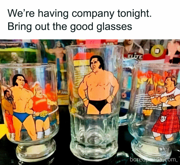 Vintage wrestling glasses on a table with colorful old-timey packaging in the background, evoking nostalgic vintage vibes.