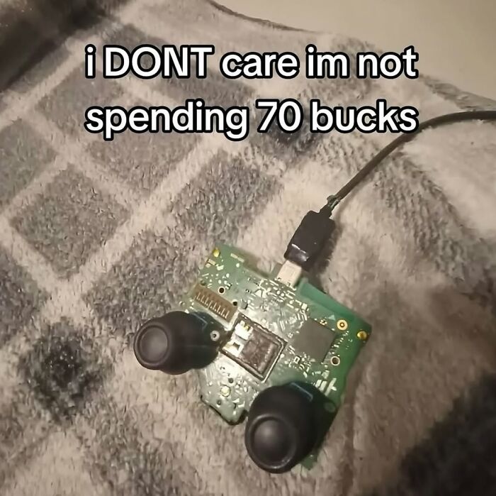 Circuit board with attached joystick buttons and USB cable, an example of cursed images from a popular IG page.