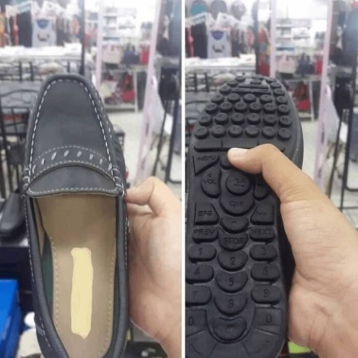 Loafer shoe with a sole designed to look like a remote control, featured on a page sharing daily cursed images.