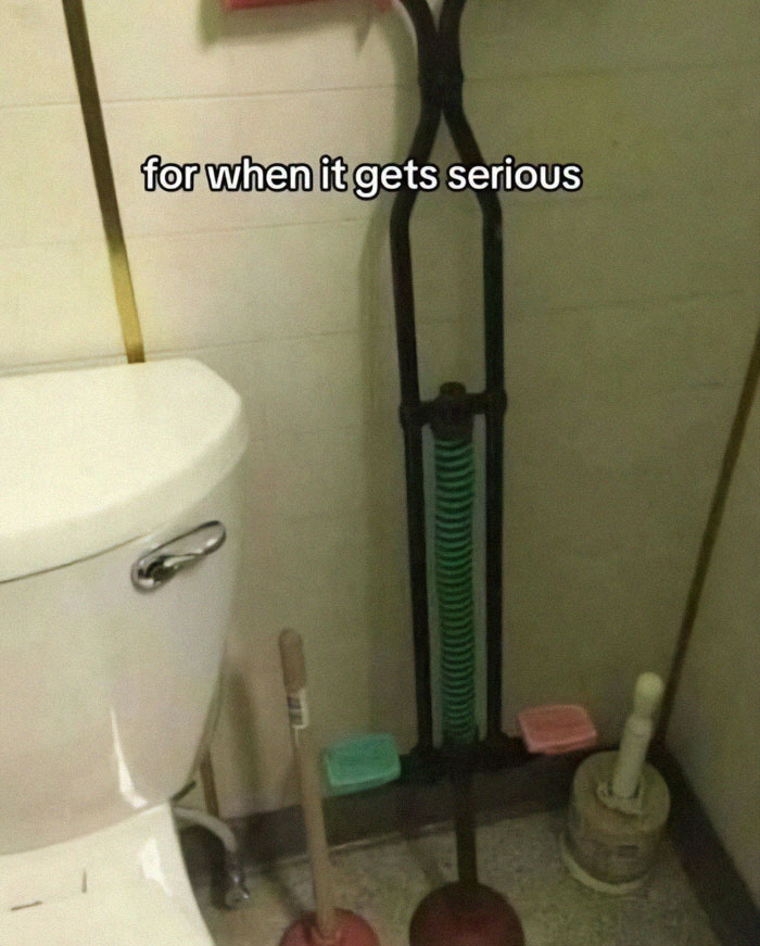 Bathroom plunger meme with an unusual tool, humor for those with a broken sense of humor shown in a home setting