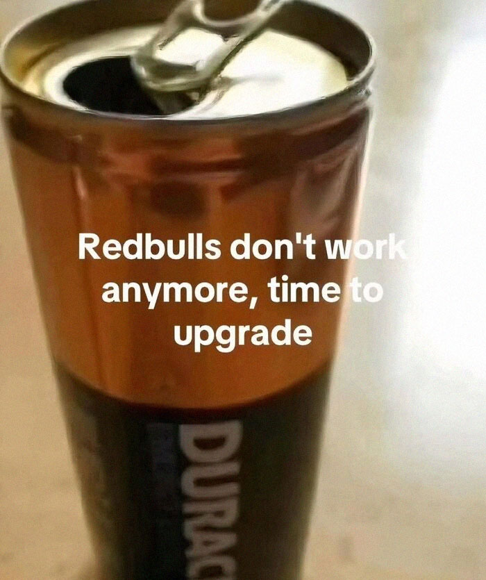 Energy drink can edited to look like a battery with text about upgrading since Redbulls don't work, humor for broken sense of humor memes.