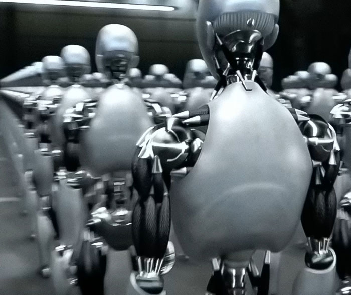 A group of futuristic metallic robots standing in formation with detailed mechanical limbs and torsos.