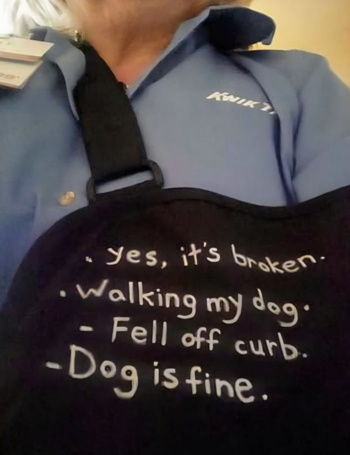 Person wearing a sling with witty text humorously explaining their injury while walking their dog, showing cleverness in real life.