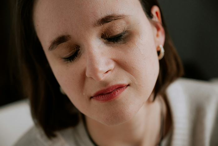 Woman agrees to temporary houseguest, looking sad and tearful after missing payments and cleaning up after parties. Woman agrees to temporary houseguest, looking sad and tearful after missing payments and cleaning up after parties.