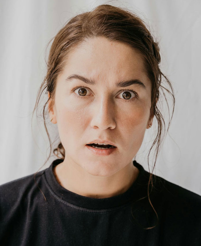 Surprised woman with brown hair and wide eyes, representing a husband hiding an affair for 9 years and secret revealed. Surprised woman with brown hair and wide eyes, representing a husband hiding an affair for 9 years and secret revealed.